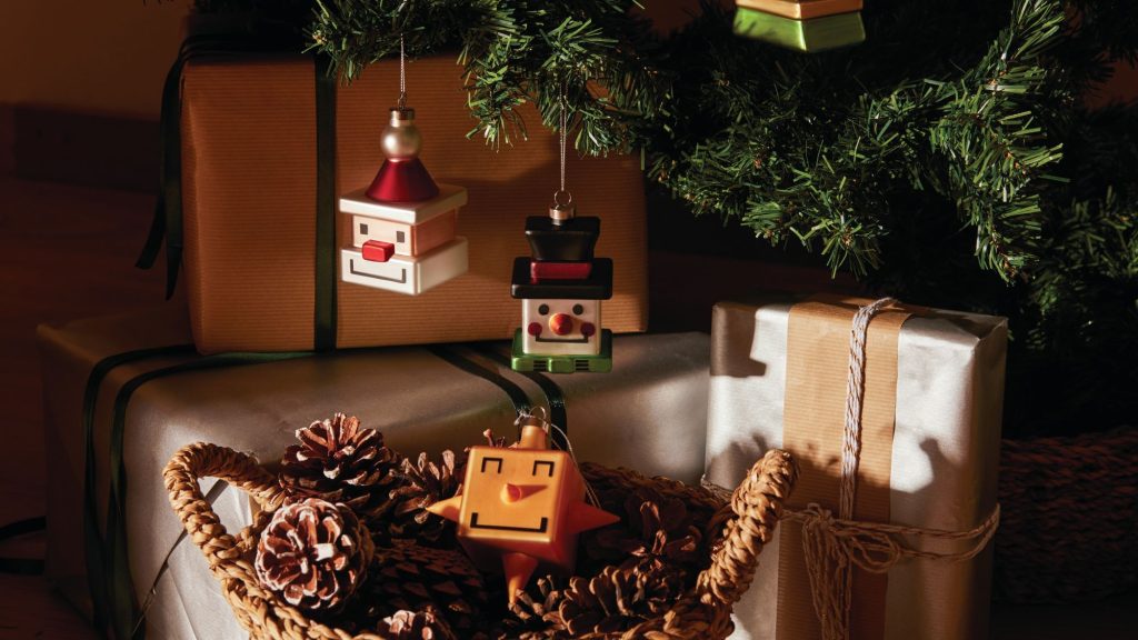 Contemporary Christmas ornaments in the shape of a snowman, Father Christmas and a star